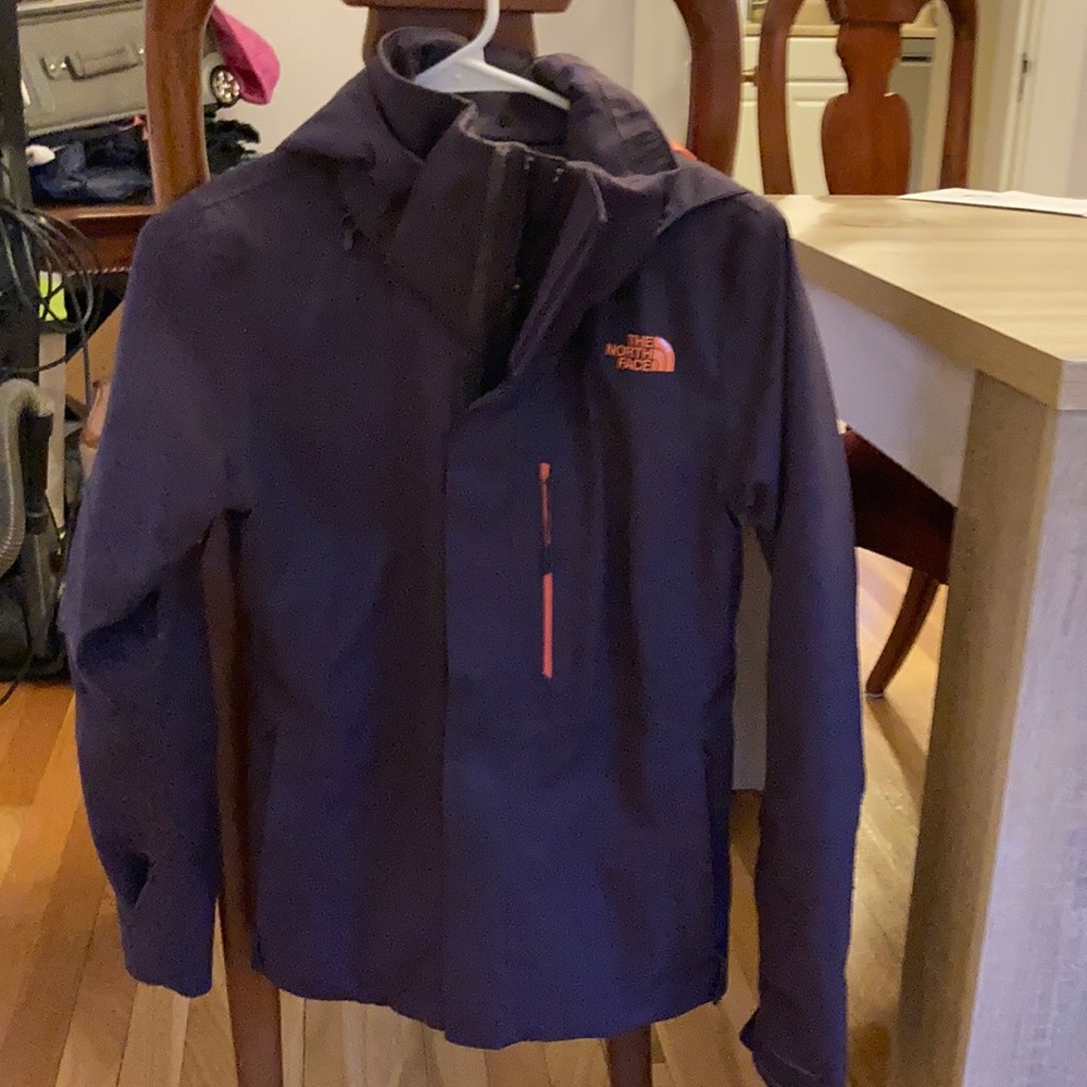 The North Face Women’s purple and orange jacket